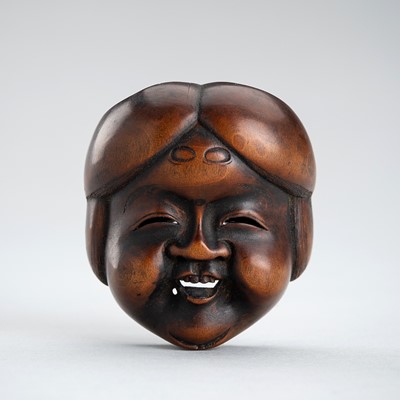 MIWA: A WOOD MASK NETSUKE OF OKAME, EDO PERIOD