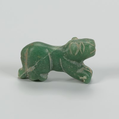 Lot 1095 - A PYU SERPENTINE ‘TIGER’ TALISMAN, 200-100 CE