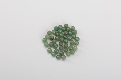 Lot 1790 - A LOT WITH 44 SMALL CHINESE JADEITE BEADS