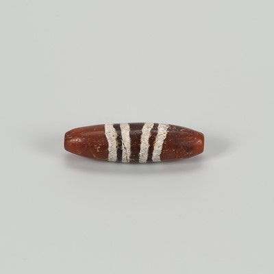 Lot 1508 - AN ETCHED TIBETAN AGATE ‘CHUNG DZI’ BEAD, c. 500-1000 CE