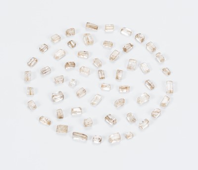 Lot 1115 - A LOT WITH 54 RECTANGULAR PYU ROCK CRYSTAL BEADS