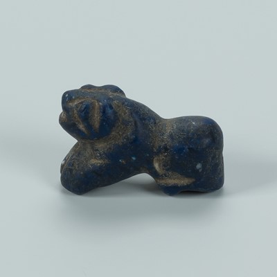 Lot 1379 - A BACTRIAN LAPIS LAZULI AMULET OF A TIGER, c. 2500 YEARS OLD