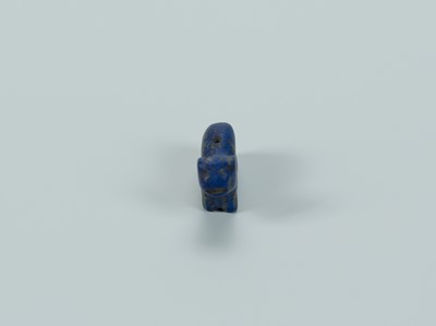 Lot 1370 - A BACTRIAN LAPIS LAZULI AMULET OF AN ANIMAL, c. 2500 YEARS OLD