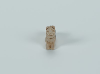 Lot 1393 - A BACTRIAN AGATE AMULET OF A LION, c. 2500 YEARS OLD