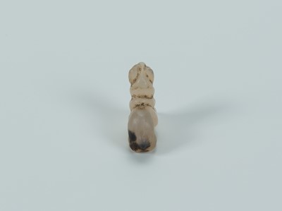 Lot 1393 - A BACTRIAN AGATE AMULET OF A LION, c. 2500 YEARS OLD