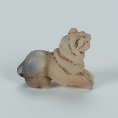 Lot 1393 - A BACTRIAN AGATE AMULET OF A LION, c. 2500 YEARS OLD