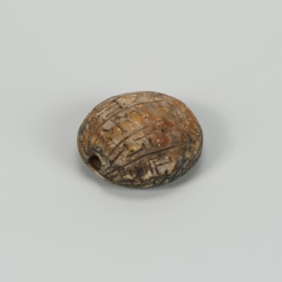 Lot 1292 - A CUNEIFORM INSCRIBED STONE BEAD, 3RD-1ST MILLENNIUM BC