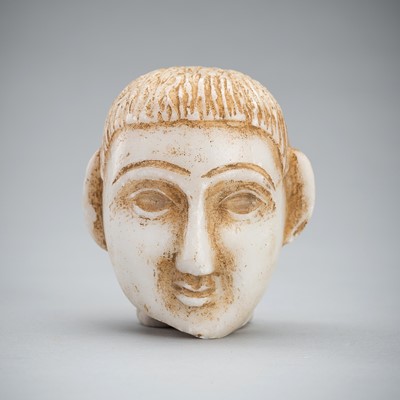 Lot 1435 - A BACTRIAN WHITE MARBLE HEAD, LATE 3RD TO EARLY 2ND MILLENNIUM BC