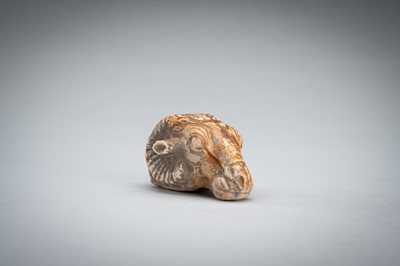 Lot 1422 - A SMALL BACTRIAN STONE CARVING OF A GOAT HEAD