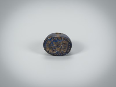 Lot 1343 - A BACTRIAN LAPIS LAZULI INTAGLIO SEAL WITH A PORTRAIT, c. 2ND CENTURY BC