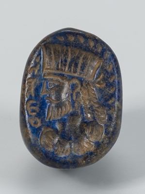 Lot 1343 - A BACTRIAN LAPIS LAZULI INTAGLIO SEAL WITH A PORTRAIT, c. 2ND CENTURY BC