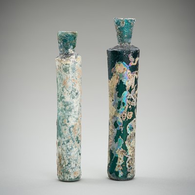 Lot 1303 - A PAIR OF ROMAN GLASS BOTTLES, c. 1ST CENTURY AD