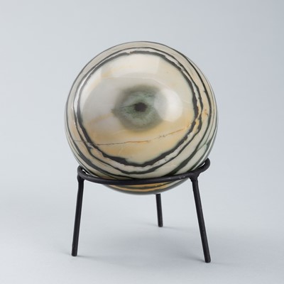 Lot 1542 - A LARGE HARDSTONE BUDDHA EYE SPHERE, 19TH CENTURY