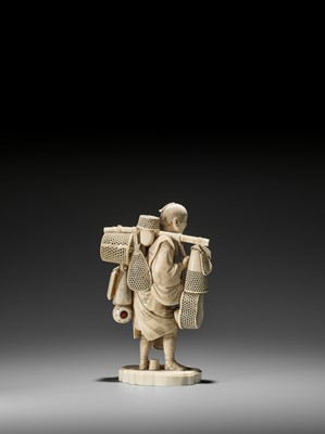 Lot 204 - EISAI: AN IMPRESSIVE IVORY OKIMONO OF A BASKET AND DRUM SELLER
