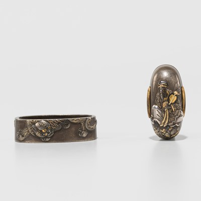 Lot 283 - SHIMAMURA MITSUYOSHI: A FINE SHIBUICHI FUCHI AND KASHIRA WITH BUKAN AND HIS TIGER