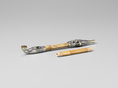 Lot 71 - SHORYUKEN MASATERU: A FINE AND LARGE SILVER AND BAMBOO KISERU (PIPE) DEPICTING THE BATTLE OF UJI