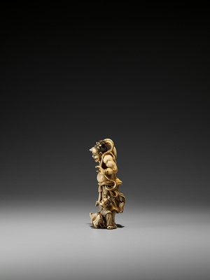 Lot 192 - ICHIRYUSAI: AN IVORY OKIMONO OF A NIO GUARDIAN AND SCULPTOR