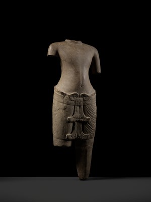 Lot 347 - A SANDSTONE TORSO OF A MALE DEITY, KHMER, ANGKOR PERIOD
