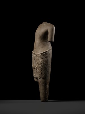 Lot 347 - A SANDSTONE TORSO OF A MALE DEITY, KHMER, ANGKOR PERIOD