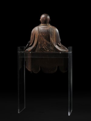 Lot 161 - A LARGE WOOD FIGURE OF A FUDAISHI, C. 1700