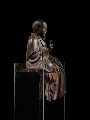 Lot 161 - A LARGE WOOD FIGURE OF A FUDAISHI, C. 1700