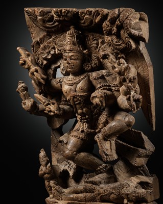 Lot 297 - A WOOD RELIEF OF KALI TRAMPLING UPON SHIVA, TAMIL NADU, 18TH CENTURY