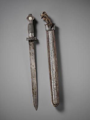 Lot 8 - AN IRON AND SILVER REPOUSSÉ CEREMONIAL SWORD AND SCABBARD