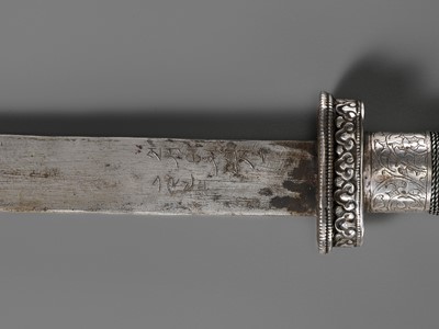 Lot 8 - AN IRON AND SILVER REPOUSSÉ CEREMONIAL SWORD AND SCABBARD