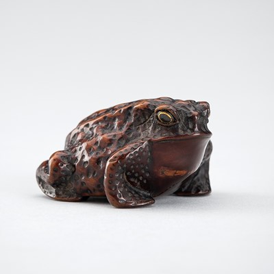 Lot 375 - SHIGETADA: A WOOD NETSUKE OF A TOAD