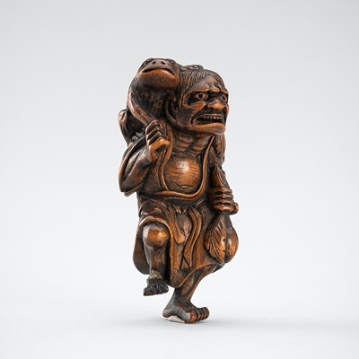 Lot 450 - GYOKKO: A WOOD NETSUKE OF GAMA SENNIN AND HIS TOAD