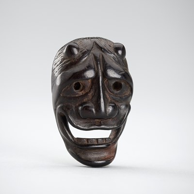 Lot 480 - DEME SUKEMITSU: A WOOD MASK NETSUKE OF HANNYA