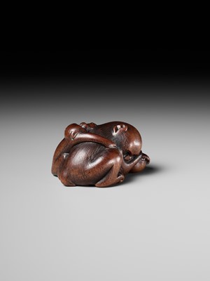 Lot 143 - MASANOBU: A SUPERB WOOD NETSUKE OF A MONKEY AND YOUNG