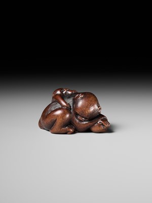 Lot 143 - MASANOBU: A SUPERB WOOD NETSUKE OF A MONKEY AND YOUNG