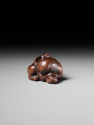 Lot 143 - MASANOBU: A SUPERB WOOD NETSUKE OF A MONKEY AND YOUNG