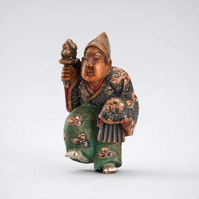 Lot 545 - NAGAMICHI SHUZAN: A POLYCHROME WOOD NETSUKE OF A SAMBASO DANCER