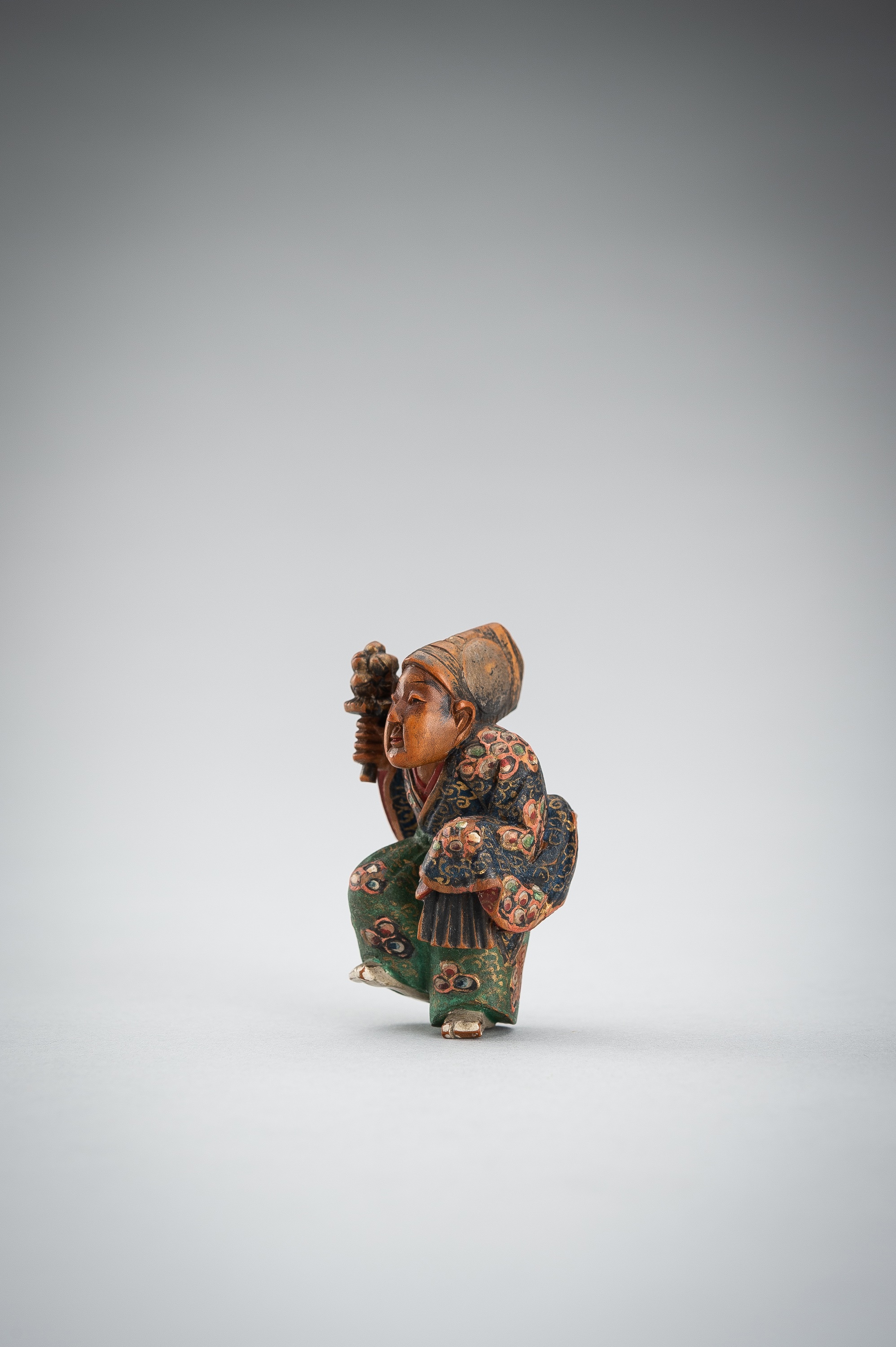 Lot 545 - NAGAMICHI SHUZAN: A POLYCHROME WOOD NETSUKE