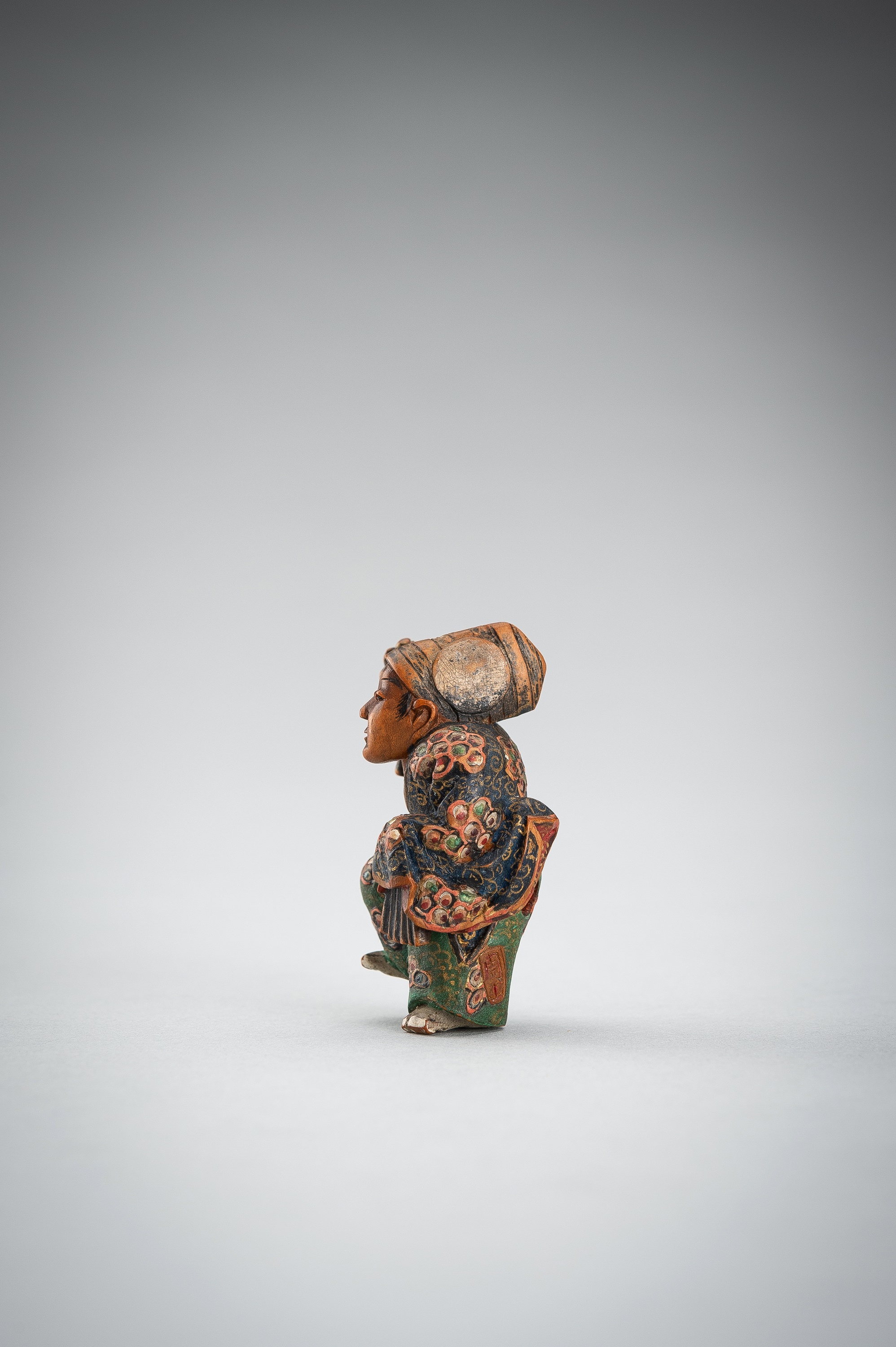 Lot 545 - NAGAMICHI SHUZAN: A POLYCHROME WOOD NETSUKE