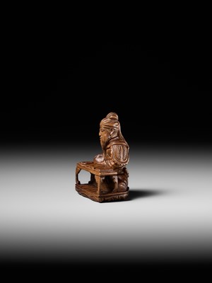 Lot 209 - GYOKURINTEI: A WOOD NETSUKE OF KOMEI