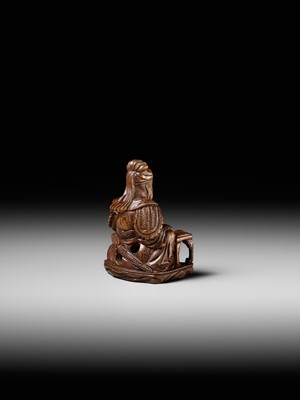 Lot 209 - GYOKURINTEI: A WOOD NETSUKE OF KOMEI