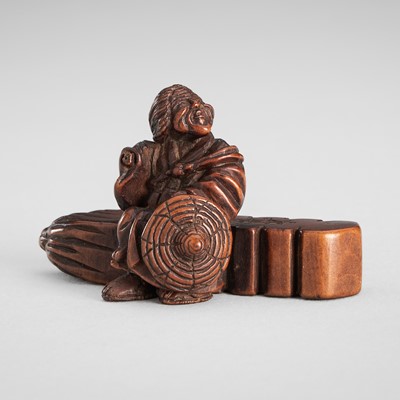 Lot 1592 - A SIGNED WOOD NETSUKE OF SOTOBA KOMACHI