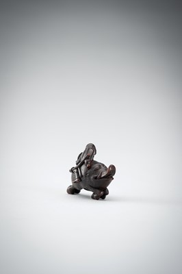 Lot 547 - SHURAKU: A WOOD NETSUKE OF NITTA NO SHIRO RIDING A WILD BOAR