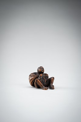 Lot 548 - A RARE WOOD NETSUKE OF A BOY WITH SACK