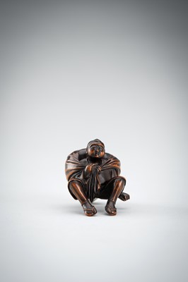 Lot 548 - A RARE WOOD NETSUKE OF A BOY WITH SACK