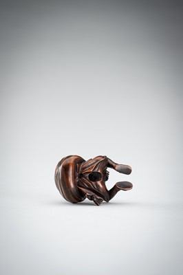 Lot 548 - A RARE WOOD NETSUKE OF A BOY WITH SACK