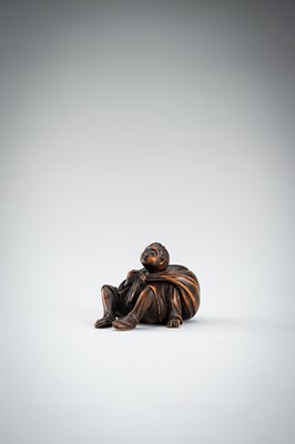 Lot 548 - A RARE WOOD NETSUKE OF A BOY WITH SACK