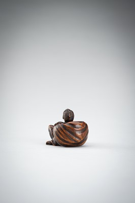 Lot 548 - A RARE WOOD NETSUKE OF A BOY WITH SACK