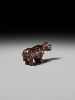 Lot 285 - OUCHI SOSUI: A FINE SO SCHOOL WOOD NETSUKE OF AN ARCHAIC CHINESE BRONZE BUFFALO