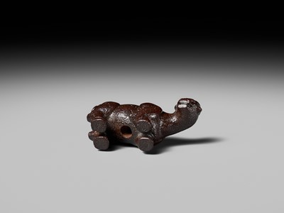 Lot 285 - OUCHI SOSUI: A FINE SO SCHOOL WOOD NETSUKE OF AN ARCHAIC CHINESE BRONZE BUFFALO