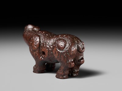 Lot 285 - OUCHI SOSUI: A FINE SO SCHOOL WOOD NETSUKE OF AN ARCHAIC CHINESE BRONZE BUFFALO