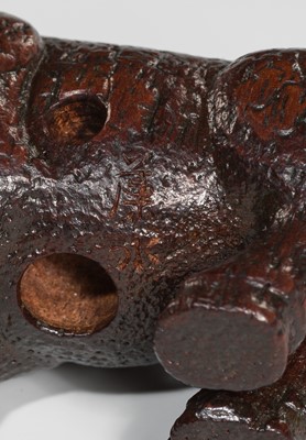 Lot 285 - OUCHI SOSUI: A FINE SO SCHOOL WOOD NETSUKE OF AN ARCHAIC CHINESE BRONZE BUFFALO